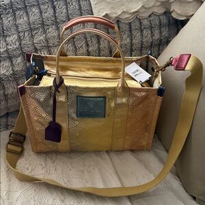 Kurt Geiger SouthBank Tote  NWT. Stylish Gold and Purple hues.